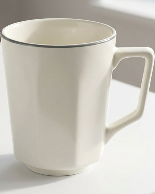 Zexan Faceted Porcelain Coffee Mug 330 ml Ivory and Graphite - Lifestyle view